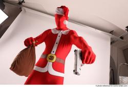 JOEL_ADAMSON CHRISTMAS VALLAIN WITH GUN AND BAG